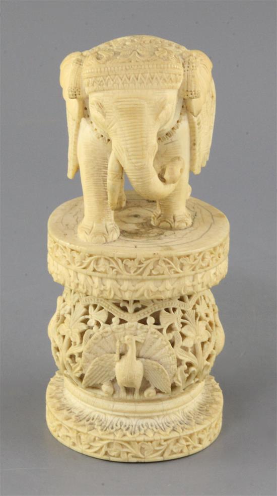 An Indian or Burmese ivory figure of an elephant, late 19th century, height 20cm, one tusk lacking